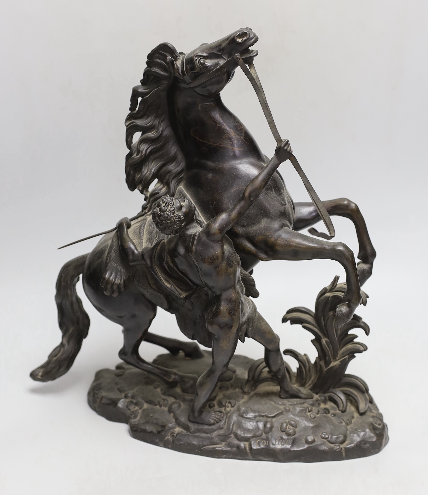 After Coustou, a pair of bronze ‘Marly’ horses, 39cm high, 38cm wide